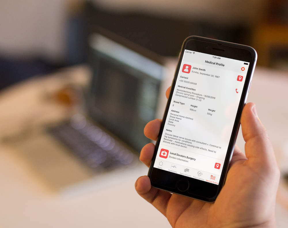 Person is holding a i phone, displaying My Health Wallet App Personal Profile Screen